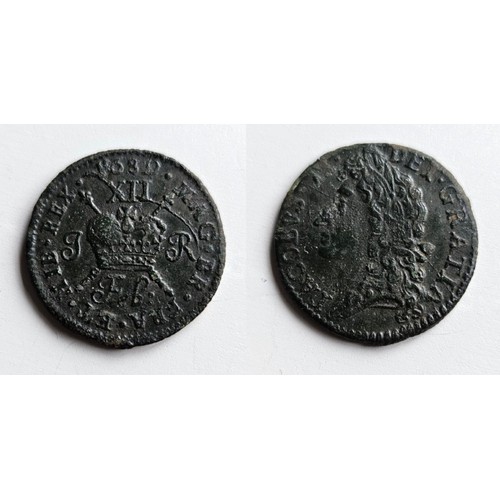 70 - Ireland. James II Gun money shilling dated Feb 1689. Obverse No.2. Reverse type D. Coin is in very f... 