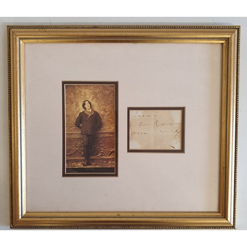 Oscar Wilde. Gilt framed original albumen print of a photograph of Wilde taken by Napoleon Saroney, a renowned New York society photographer, shortly after Wilde Arrived in New York in January, 1882 to commence his first & only American tour. Also included in the frame is a note with Wilde's original signature. Both items are rare