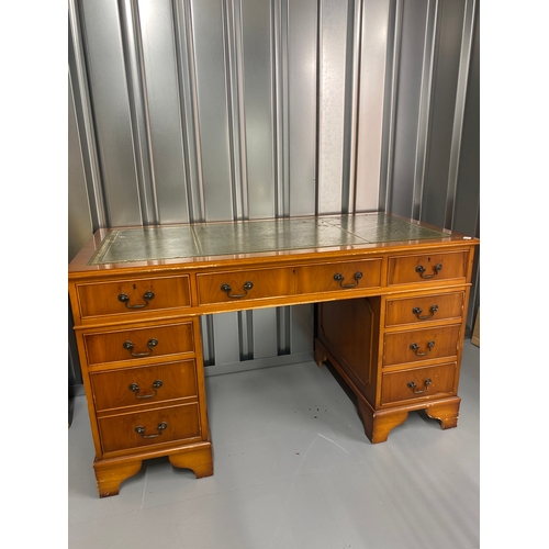 81 - Yew wood pedestal desk with leather top