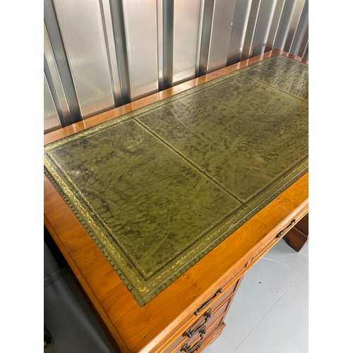 81 - Yew wood pedestal desk with leather top