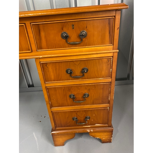 81 - Yew wood pedestal desk with leather top