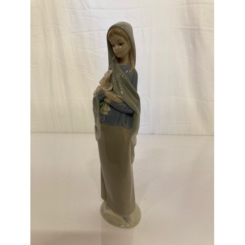 62 - Four Lladro figurines Jolie 5210 with Parasol, Pretty Picking 5222. Girl with Lilies, and a shy Geis... 