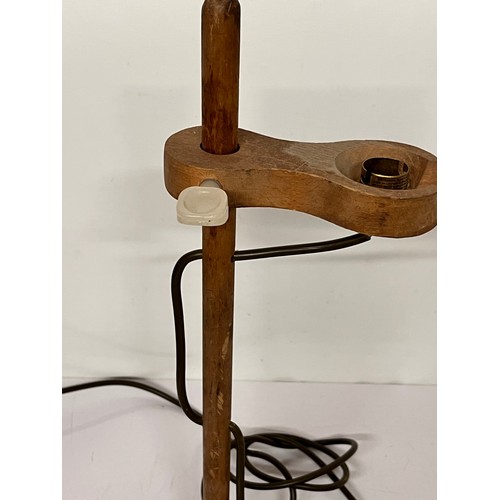 22 - Table lamp, an industrial wooden laboratory stand converted to a desk light, 55cm high

This lot is ... 