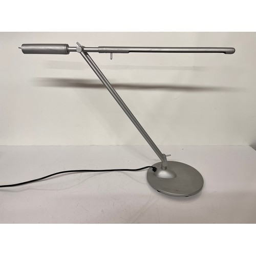 28 - Mid century design, adjustable desk lamp marked for Glowworm to the base

This lot is available for ... 