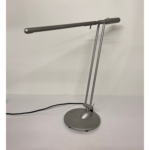 28 - Mid century design, adjustable desk lamp marked for Glowworm to the base

This lot is available for ... 