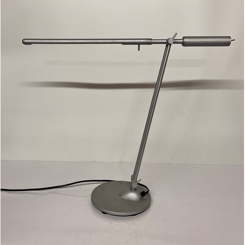 28 - Mid century design, adjustable desk lamp marked for Glowworm to the base

This lot is available for ... 