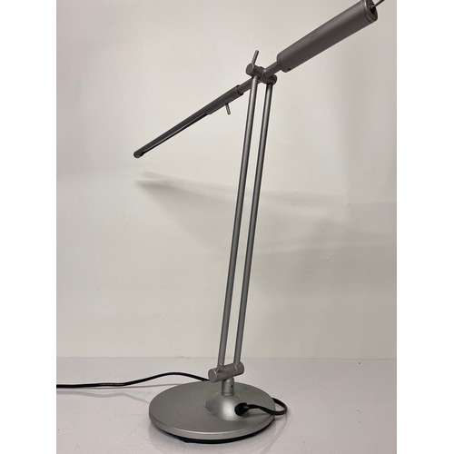 28 - Mid century design, adjustable desk lamp marked for Glowworm to the base

This lot is available for ... 