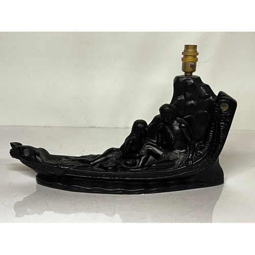 37 - Mid century figural table lamp base, Hawaiian couple in a canoe with applied decoration. 18 inches l... 