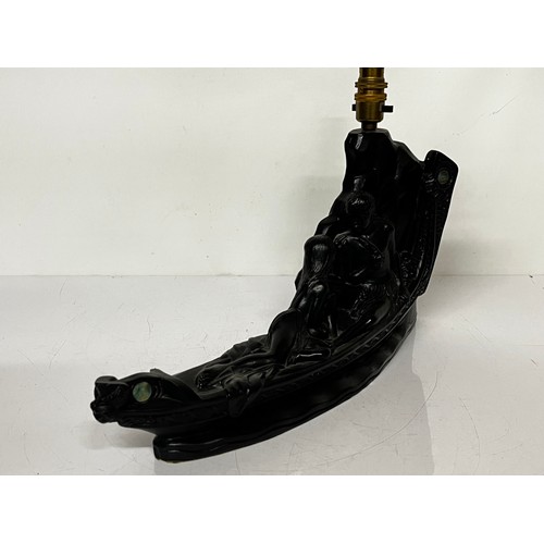 37 - Mid century figural table lamp base, Hawaiian couple in a canoe with applied decoration. 18 inches l... 