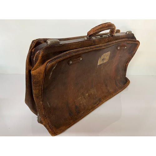 170 - Large leather Gladstone weekend bag, nicely lined interior, 24 inches long.

This lot is available f... 