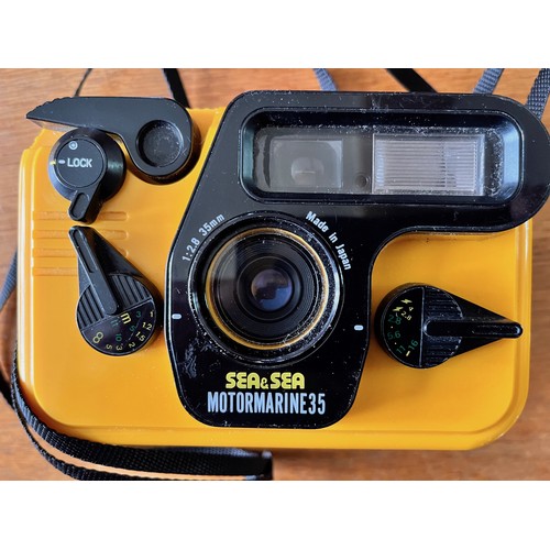 209 - Panasonic digital palm held recorder and a Cannon water proof cover for a 35 mm camera and Sea & Sea... 