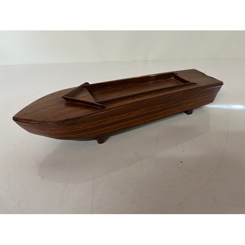 226 - Wooden speed boat, sectioned desk piece, mahogany and rosewood sections make this stunning gentleman... 