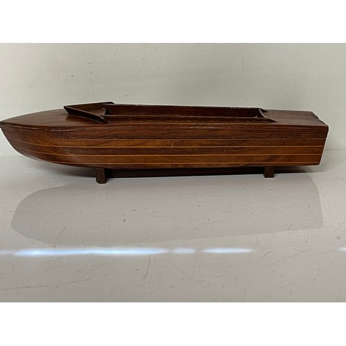 226 - Wooden speed boat, sectioned desk piece, mahogany and rosewood sections make this stunning gentleman... 