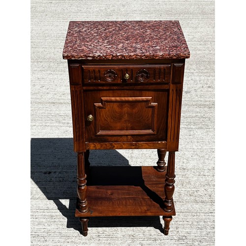 41 - A Pink Marble topped storage unit under shelf with carved decoration to the drawer front.

This lot ... 