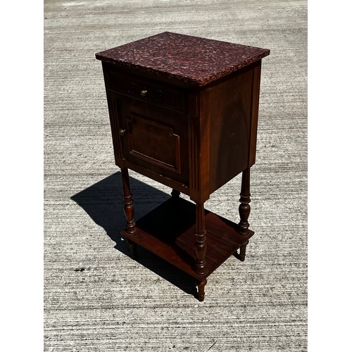 41 - A Pink Marble topped storage unit under shelf with carved decoration to the drawer front.

This lot ... 