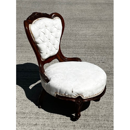 45 - Victorian upholstered nursing chair, with a carved mahogany frame.

This lot is collection only