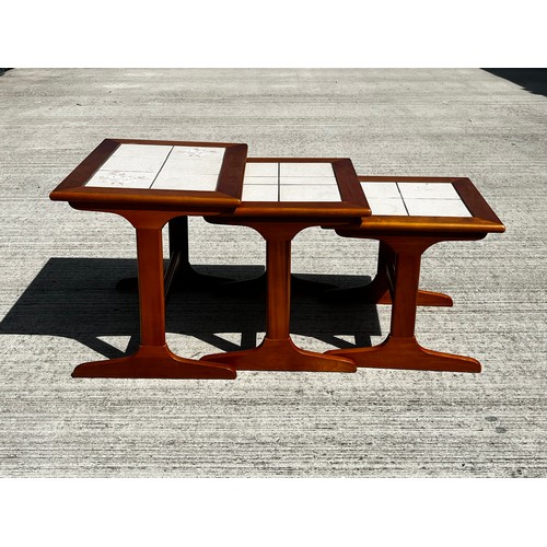 48 - Mid century furniture, a nest of tables with tiled tops

This lot is collection only