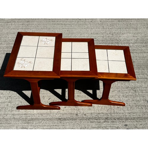 48 - Mid century furniture, a nest of tables with tiled tops

This lot is collection only