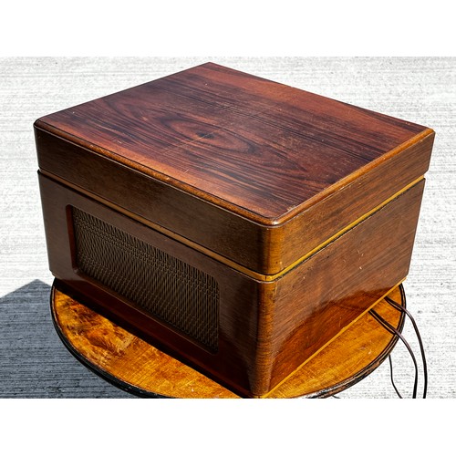 53 - Art Deco wooden cased music centre comprising a record player, radio and speaker within a single uni... 