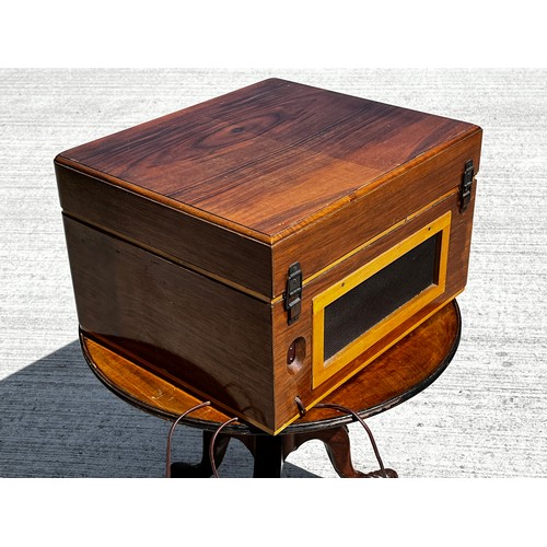 53 - Art Deco wooden cased music centre comprising a record player, radio and speaker within a single uni... 