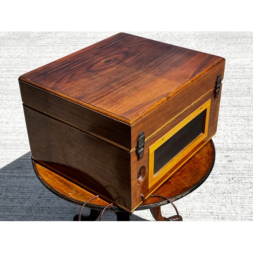 53 - Art Deco wooden cased music centre comprising a record player, radio and speaker within a single uni... 