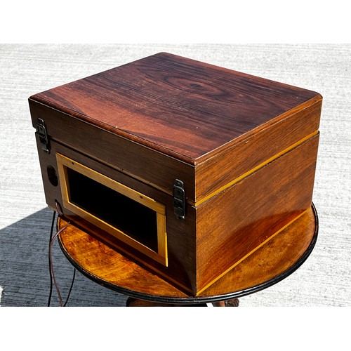 53 - Art Deco wooden cased music centre comprising a record player, radio and speaker within a single uni... 