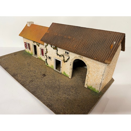 231 - Painted wooden toy house and barn, 24 inches wide.

This lot is available for in-house shipping