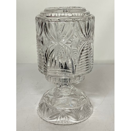 57 - Decorative clear glass table lamp and glass shade. 11 inches high 6 inches in diameter.

This lot is... 