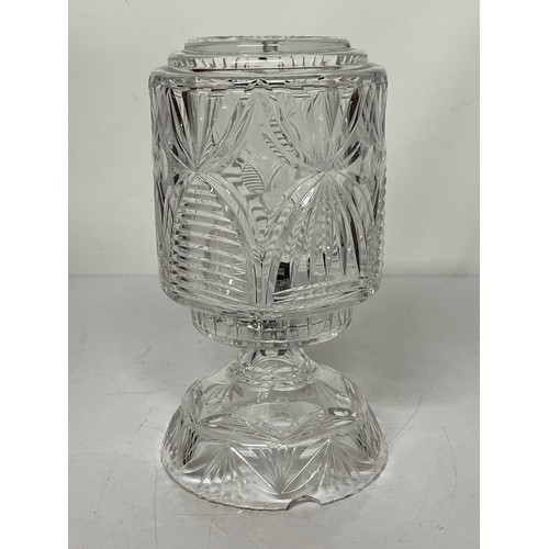 57 - Decorative clear glass table lamp and glass shade. 11 inches high 6 inches in diameter.

This lot is... 