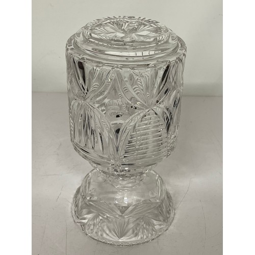 57 - Decorative clear glass table lamp and glass shade. 11 inches high 6 inches in diameter.

This lot is... 