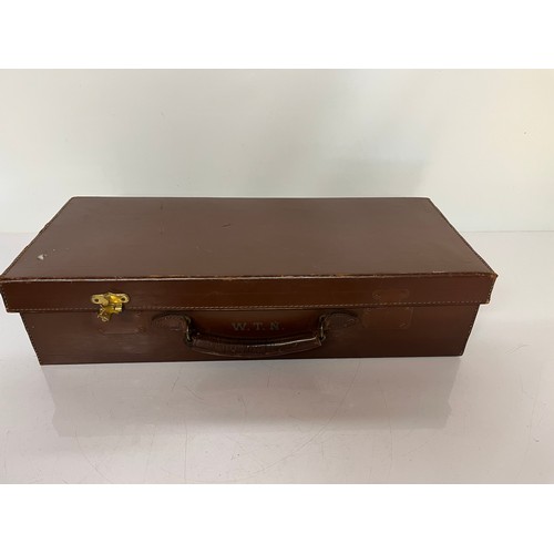 234 - Leather case with blue baize lined interior, 19.5 inches long x 8 inches wide.

This lot is availabl... 