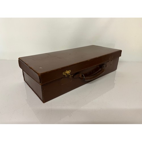 234 - Leather case with blue baize lined interior, 19.5 inches long x 8 inches wide.

This lot is availabl... 