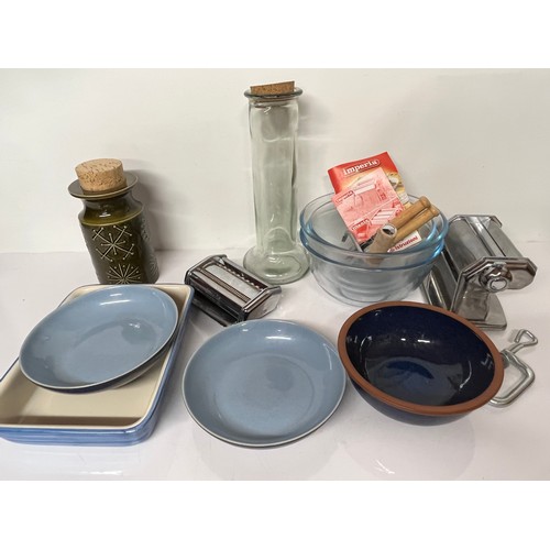 240 - Mixed lot of kitchenalia, Denby, glass bowls, a pasta machine and storage etc 

This lot is availabl... 