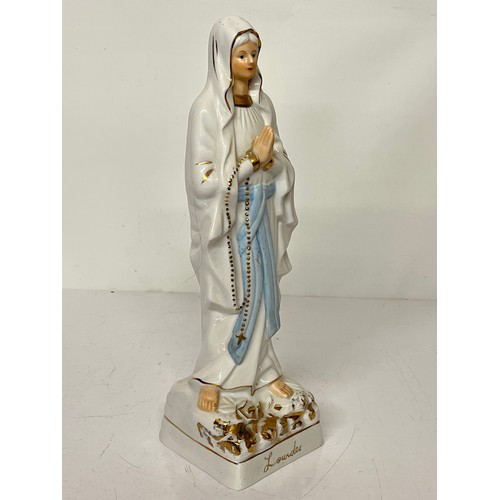 244 - Cermaic figurine of St. Bernadette of Lourdes.

This lot is available for in-house shipping