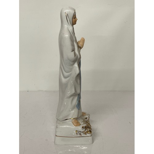 244 - Cermaic figurine of St. Bernadette of Lourdes.

This lot is available for in-house shipping