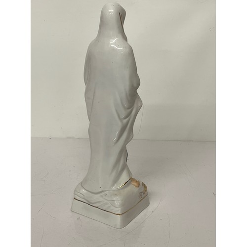 244 - Cermaic figurine of St. Bernadette of Lourdes.

This lot is available for in-house shipping