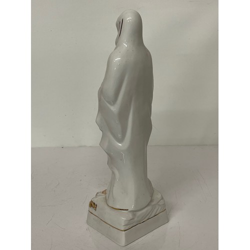 244 - Cermaic figurine of St. Bernadette of Lourdes.

This lot is available for in-house shipping