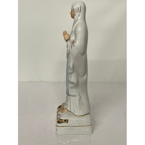 244 - Cermaic figurine of St. Bernadette of Lourdes.

This lot is available for in-house shipping