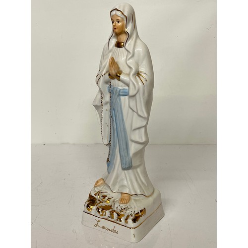 244 - Cermaic figurine of St. Bernadette of Lourdes.

This lot is available for in-house shipping