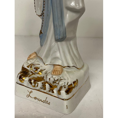 244 - Cermaic figurine of St. Bernadette of Lourdes.

This lot is available for in-house shipping