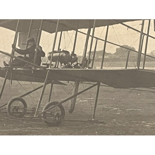 272 - Period real photographic postcard showing early aviators and early biplane.

This lot is available f... 