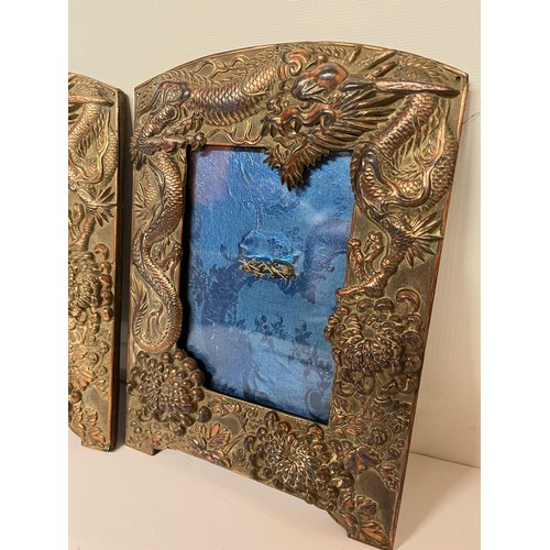 287 - Two plated copper picture frames decorated with three toed Dragons and Chrysanthemums, each is 10 in... 