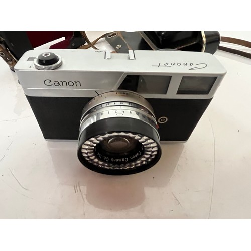 294 - Cased Cannon 35mm camera, an early Canonet model Canon camera 

This lot is available for in-house s... 