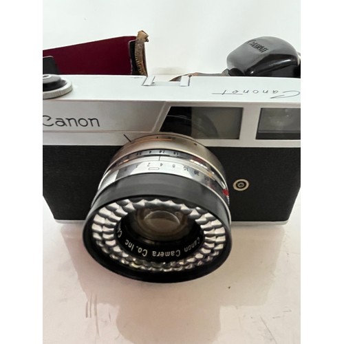 294 - Cased Cannon 35mm camera, an early Canonet model Canon camera 

This lot is available for in-house s... 