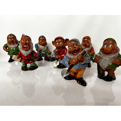 297 - Walt Disney painted terracotta figurines of the Seven Dwarfs from the Disney animated classic, each ... 