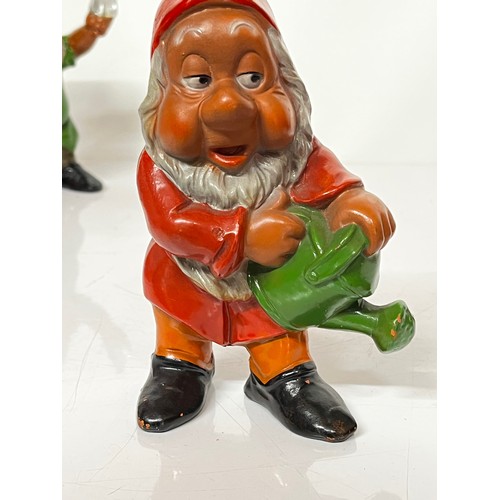 297 - Walt Disney painted terracotta figurines of the Seven Dwarfs from the Disney animated classic, each ... 