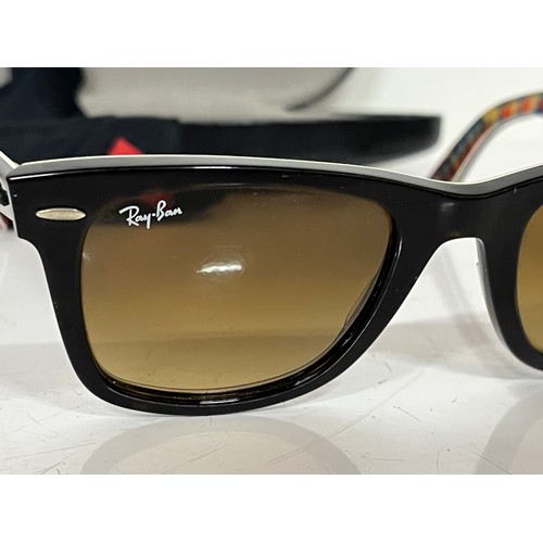 301 - Pair of Ray Ban Wayfarer sunglasses in with tartan pattern to the inside of the frames, in original ... 