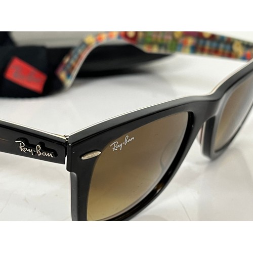 301 - Pair of Ray Ban Wayfarer sunglasses in with tartan pattern to the inside of the frames, in original ... 