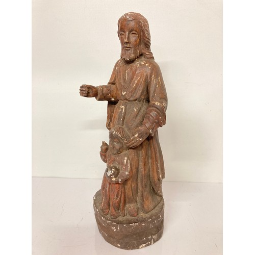 329 - C19th religious carved wooden figures of a man and a boy with painted jesso surface finish. 20 inche... 