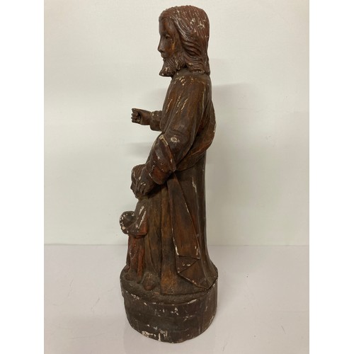 329 - C19th religious carved wooden figures of a man and a boy with painted jesso surface finish. 20 inche... 